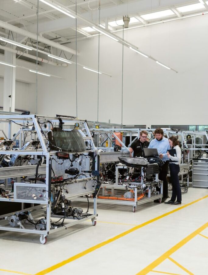 man in black jacket sitting on black chair