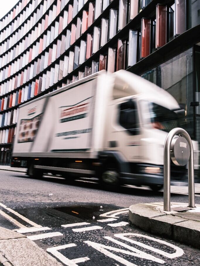 white and brown truck on road during daytime