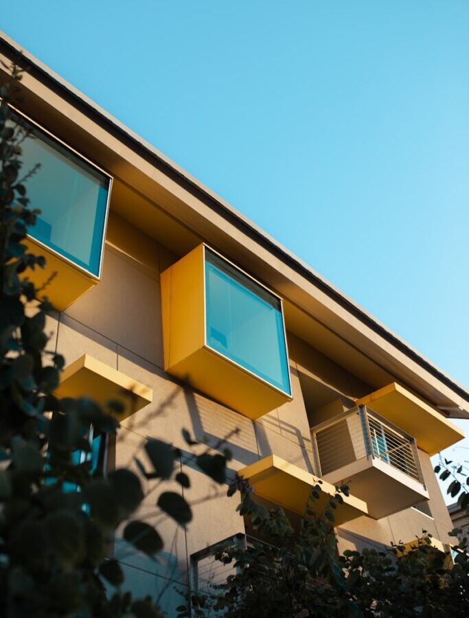 a yellow house with windows